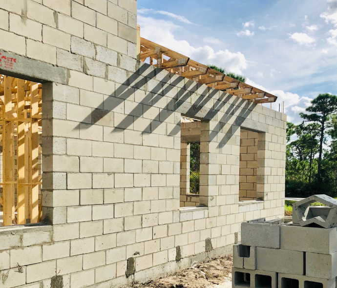 Residential masonry construction with concrete foundation walls by DMG Masonry in Calgary